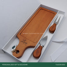 Load image into Gallery viewer, "Nibble Nosh Set" – a delightful set for tasty moments! This personalized wooden gift set features a charming stylish cheese board and two cutlery pieces. Perfect for corporate events, weddings, Valentine's Day, anniversaries, birthdays, or any special occasion. Elevate your nibbles and create lasting memories with this thoughtful set. It's a charming choice for personalized event tokens. Share the joy of nibbling! TUGON 6100 NEGROS OCCIDENTAL