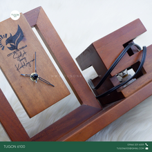 Load image into Gallery viewer, A timeless blend of function and sentiment, this personalized desk clock with plaque set is the perfect addition to any workspace. Featuring a sleek timepiece mounted on a premium wooden base, it includes space for custom engraving—whether it's a name, message, logo, or special dedication. Ideal as a corporate giveaway, employee recognition token, retirement gift, or milestone award, this elegant piece combines practical timekeeping with lasting meaning.
Let your message stand the test of time with this re