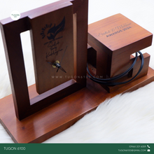 Load image into Gallery viewer, A timeless blend of function and sentiment, this personalized desk clock with plaque set is the perfect addition to any workspace. Featuring a sleek timepiece mounted on a premium wooden base, it includes space for custom engraving—whether it's a name, message, logo, or special dedication. Ideal as a corporate giveaway, employee recognition token, retirement gift, or milestone award, this elegant piece combines practical timekeeping with lasting meaning.
Let your message stand the test of time with this re