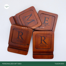 Load image into Gallery viewer, Keep your device and small items safe with this stylish holder! Crafted with sturdy mahogany wood, it's perfect for your desk or bedside table. The included trinket tray is the perfect fit for holding keys, jewelry, and other items. Make your life easier with this modern gadget! Look to this holder for corporate gifts, wedding mementos, Christmas presents, and all other gifting needs. - TUGON 6100