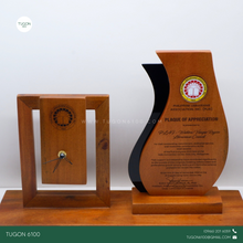 Load image into Gallery viewer, Personalized Desk Clock with Plaque Set
Product Name: "Cian with Norway"
A timeless blend of function and sentiment, this personalized desk clock with plaque set is the perfect addition to any workspace. Featuring a sleek timepiece mounted on a premium wooden base, it includes space for custom engraving—whether it's a name, message, logo, or special dedication. Ideal as a corporate giveaway, employee recognition token, retirement gift, or milestone award, this elegant piece combines practical timekeeping w