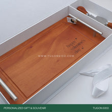 Load image into Gallery viewer, "Grazing Goodness Set" - a classy addition to any celebration. The steak board is crafted for both style and practicality, providing a fantastic backdrop for your favorite cuts. The four cutlery pieces add a touch of elegance to your dining experience.  Whether it's for a corporate event, wedding, Valentine's Day, anniversary, birthday, or any special moment, our set makes for unforgettable event tokens. Crafted with care, it's a charming and thoughtful way to celebrate life's moments. TUGON 6100