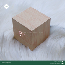 Load image into Gallery viewer, Desk Alarm Clock
Product Name: &quot;Cana&quot;

Bring natural warmth and modern function to your space with Cana, an elegant bamboo desk alarm clock designed for simplicity and style. Made from eco-friendly bamboo, this compact digital clock features a clear LED time display, alarm function, and temperature reading, making it a perfect fit for your bedside table, office desk, or study area.

Sleek and minimal, Cana adds a calming, earthy touch to any modern setup. It’s not just a timekeeper — it’s a stylish and sust
