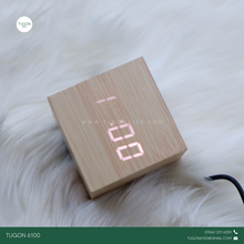 Load image into Gallery viewer, Desk Alarm Clock
Product Name: &quot;Cana&quot;

Bring natural warmth and modern function to your space with Cana, an elegant bamboo desk alarm clock designed for simplicity and style. Made from eco-friendly bamboo, this compact digital clock features a clear LED time display, alarm function, and temperature reading, making it a perfect fit for your bedside table, office desk, or study area.

Sleek and minimal, Cana adds a calming, earthy touch to any modern setup. It’s not just a timekeeper — it’s a stylish and sust
