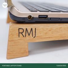 Load image into Gallery viewer, Enhance Your Workspace with Tugon 6100&#39;s Wooden Laptop Stand    Are you searching for the perfect corporate gift or wedding souvenir that combines functionality and elegance? Look no further than our Wooden Laptop Stand. This beautifully crafted stand is not just an accessory; it&#39;s an essential tool for anyone who spends significant time in front of a screen.
