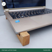 Load image into Gallery viewer, Enhance Your Workspace with Tugon 6100&#39;s Wooden Laptop Stand    Are you searching for the perfect corporate gift or wedding souvenir that combines functionality and elegance? Look no further than our Wooden Laptop Stand. This beautifully crafted stand is not just an accessory; it&#39;s an essential tool for anyone who spends significant time in front of a screen.
