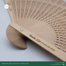 Load image into Gallery viewer, Product Code: &quot;Flavia&quot;

This Bamboo Chinese Folding Fan is light weight and&nbsp;portable. So easy to use and very convenient to carry.


With FREE LASER ENGRAVING of your preferred name or logo.

PERFECT GIFT IDEAS FOR: Wedding souvenir, Christmas Gift, Corporate Gift, Anniversary Gift, Birthday Gift, Father&#39;s Day Gift, Mother&#39;s Day Gift, personal use.

ALL OUR&nbsp;ITEMS ARE UNIQUE!&nbsp;As a disclaimer, no piece of wood is exactly the same. There may be slight variations in the color of the wood.
