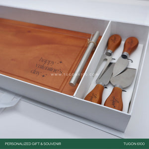 "Grazing Goodness Set" - a classy addition to any celebration. The steak board is crafted for both style and practicality, providing a fantastic backdrop for your favorite cuts. The four cutlery pieces add a touch of elegance to your dining experience.  Whether it's for a corporate event, wedding, Valentine's Day, anniversary, birthday, or any special moment, our set makes for unforgettable event tokens. Crafted with care, it's a charming and thoughtful way to celebrate life's moments. TUGON 6100