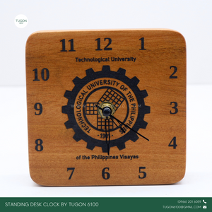 This clock is crafted from high-quality mahogany wood and perfect for adding a personal touch to your workspace. This elegant timepiece isn't just functional; it's a statement piece that brings warmth and character to any desk. Personalize it with a name or special message, making it a thoughtful gift for yourself or a loved one. It's more than just a clock; it's a daily reminder of the moments that matter. Whether for home or office, let this unique desk clock be your go-to for keeping time stylishly.