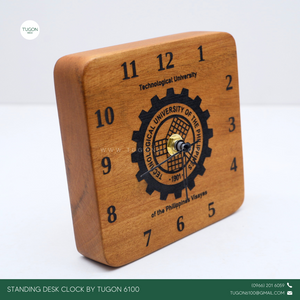 This clock is crafted from high-quality mahogany wood and perfect for adding a personal touch to your workspace. This elegant timepiece isn't just functional; it's a statement piece that brings warmth and character to any desk. Personalize it with a name or special message, making it a thoughtful gift for yourself or a loved one. It's more than just a clock; it's a daily reminder of the moments that matter. Whether for home or office, let this unique desk clock be your go-to for keeping time stylishly.