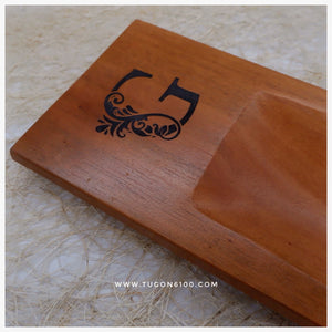 This handmade rectangular tray gives you a beautiful way to serve your snacks. A perfect idea for holiday gifts, wedding souvenirs.  Made of: Mahogany Wood Dimension: 5 in wide, 16.5 in long, 1 in thick  With FREE custom design of your choice. For your preferred design, please contact us on our facebook page, Tugon 6100.  LEAD TIME: 5-10 BUSINESS DAYS. We accept bulk orders.