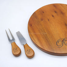 Load image into Gallery viewer, This CHEESE BOARD AND CUTLERY GIFT SET (A) is an exquisite addition to any home, offering a timeless touch of sophistication. Crafted with care and attention to detail, this stylish set comes presented as a beautiful gift that is sure to be treasured for years to come. Perfect for friends, family, or as a corporate or wedding souvenir, this luxurious set is sure to make a lasting impression.
