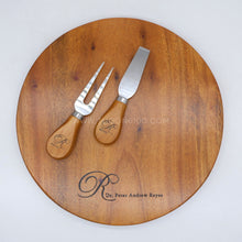 Load image into Gallery viewer, This CHEESE BOARD AND CUTLERY GIFT SET (A) is an exquisite addition to any home, offering a timeless touch of sophistication. Crafted with care and attention to detail, this stylish set comes presented as a beautiful gift that is sure to be treasured for years to come. Perfect for friends, family, or as a corporate or wedding souvenir, this luxurious set is sure to make a lasting impression.
