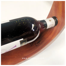 Load image into Gallery viewer, This handmade wine bottle holder is the perfect way to display your favorite wine. This is a great idea to give as housewarming gift, holiday gifts, wedding souvenirs.  Made of: Mahogany Wood Dimension: 3 in wide, 15 in long, 0.7 in thick  With FREE custom design of your choice. For your preferred design, please contact us on our facebook page, Tugon 6100.  LEAD TIME: 10-15 BUSINESS DAYS. We accept bulk orders. WINE BOTTLE NOT INCLUDED. - TUGON 6100
