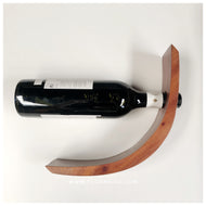 This handmade wine bottle holder is the perfect way to display your favorite wine. This is a great idea to give as housewarming gift, holiday gifts, wedding souvenirs.  Made of: Mahogany Wood Dimension: 3 in wide, 15 in long, 0.7 in thick  With FREE custom design of your choice. For your preferred design, please contact us on our facebook page, Tugon 6100.  LEAD TIME: 10-15 BUSINESS DAYS. We accept bulk orders. WINE BOTTLE NOT INCLUDED. - TUGON 6100
